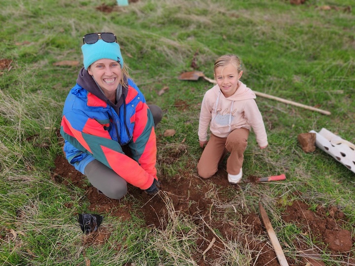 Landcare Members, Mother and Daughter Planting Trees